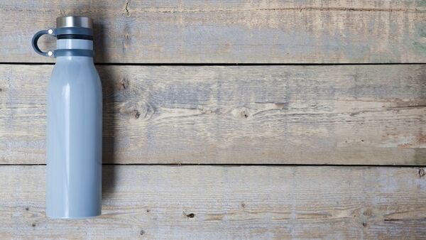 A reusable water bottle on a table